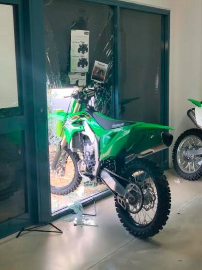 STUCK: The thieves were interrupted while trying to steal a second bike, and had to abandon it in the doorway. Photo: Supplied.