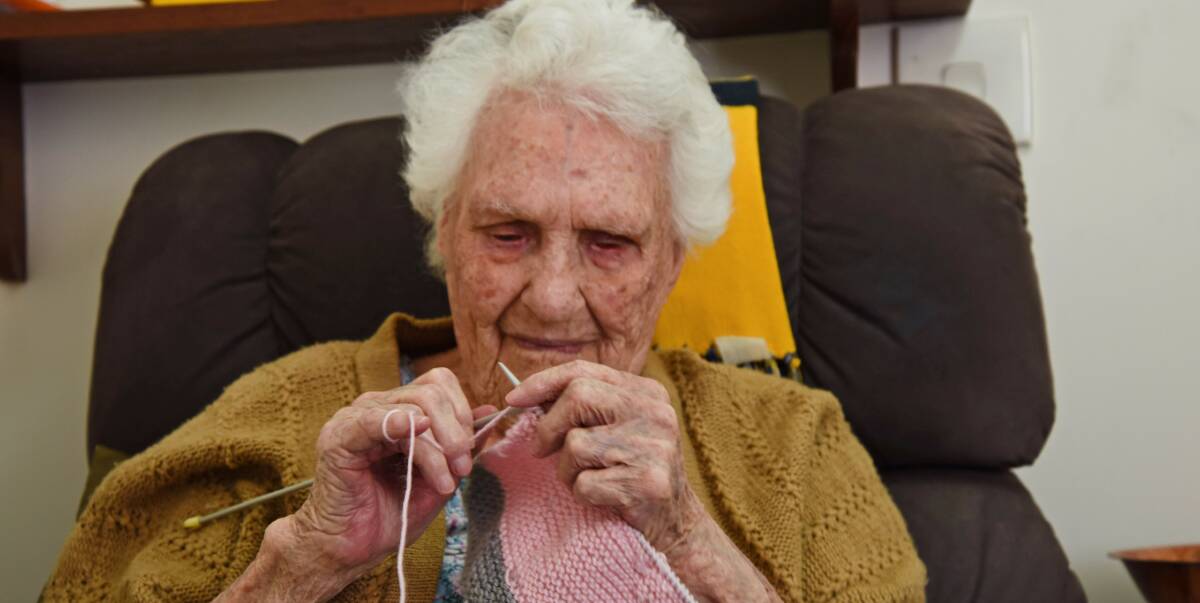 Fighter: 95-year-old blind woman Mary Butler regularly knits blankets in her Wearne House room to send to those less fortunate. Photo: Marta Pascual Juanola.