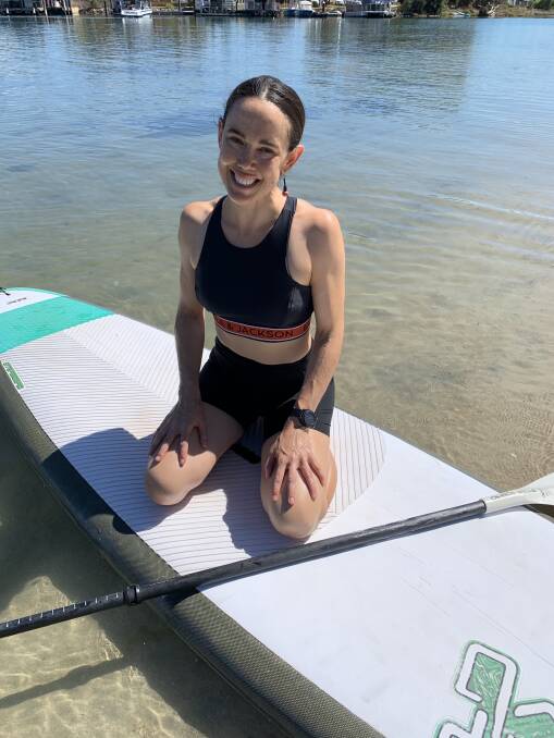 Be Yoga owner Tess Barretto says there's something special about mixing yoga poses and being on the water.