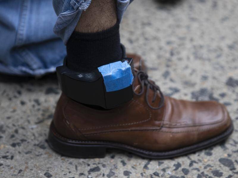 Criminals released from indefinite immigration detention will be forced to wear ankle bracelets. (AP PHOTO)