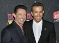Hugh Jackman and Ryan Reynolds filled in as guest co-hosts on Jimmy Kimmel Live. Photo: AP PHOTO