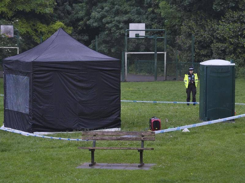 One of three men charged with helping Hong Kong's intelligence service was found dead in a UK park. (AP PHOTO)