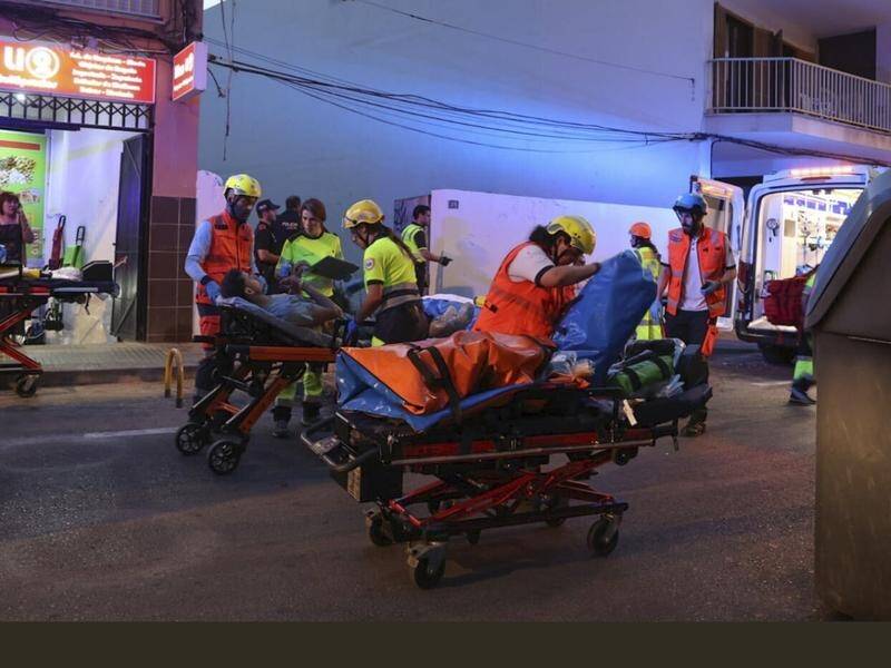 Four people are dead after a beachside restaurant building collapsed in Palma de Mallorca, Spain. (AP PHOTO)